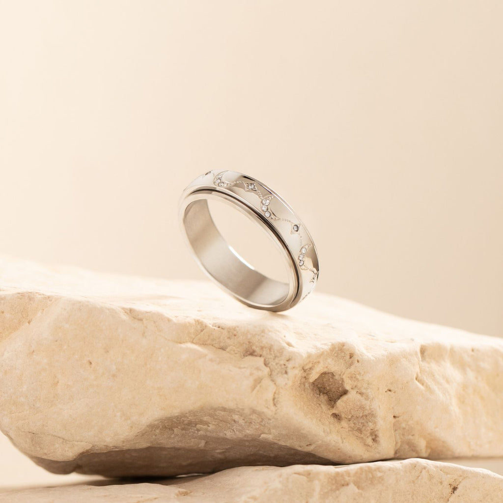 silver moon and star pattern anxiety ring