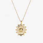 gold day and night spinning necklace
