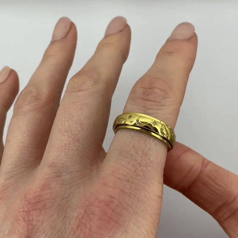 gold moon and star pattern anxiety ring