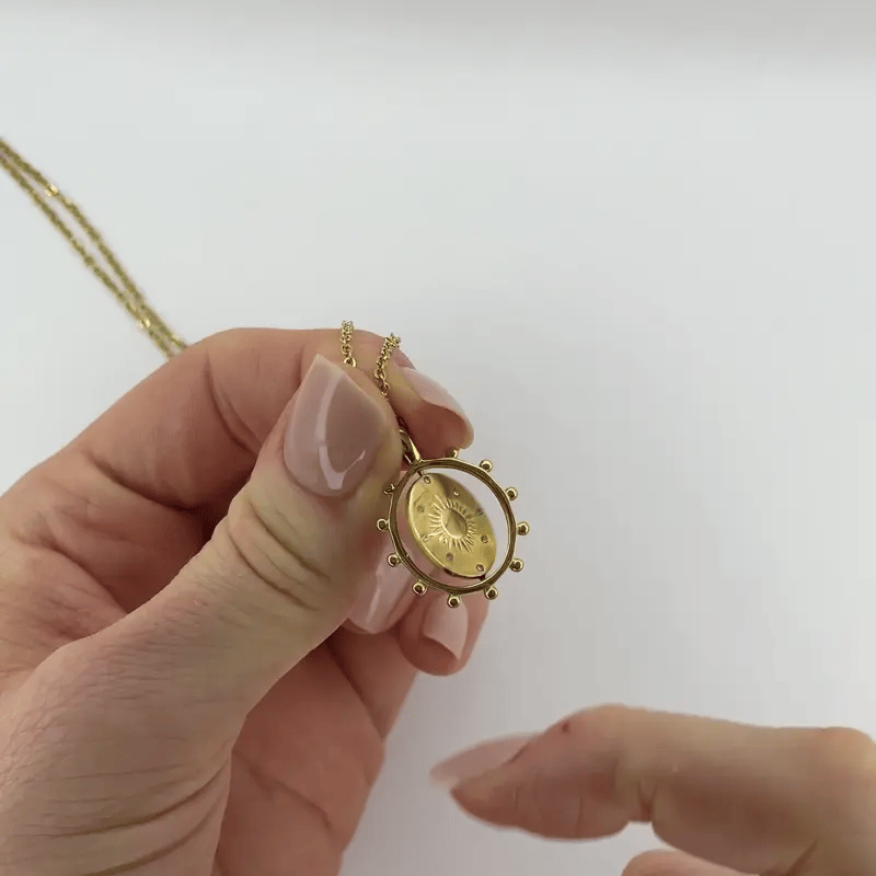 gold day and night spinning necklace