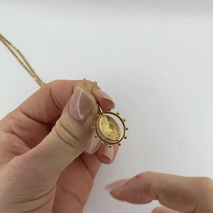 gold day and night spinning necklace