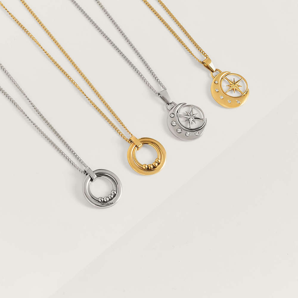silver moon and spinning star necklace